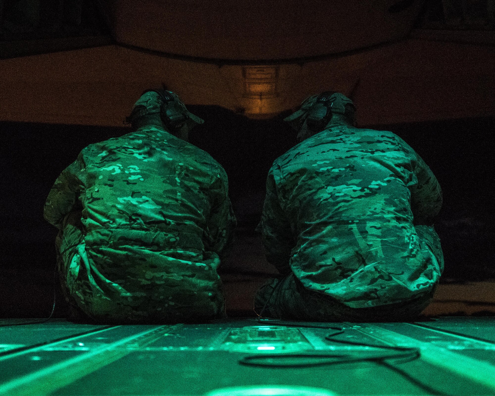 U.S. Air Force 17th Special Operations Squadron MC-130J Commando II loadmasters sit on the ramp prior to take-off July 11, 2017, at Rockhampton, Australia. In addition to supporting the training operations for the U.S. Air Force 320th Special Tactics Squadron and U.S. Marine Corps 3rd Reconnaissance Battalion, the air commandos from the 17th SOS supported the Australian Army’s 2nd Commando Regiments during Talisman Saber 2017. (U.S. Air Force photo by Capt. Jessica Tait)