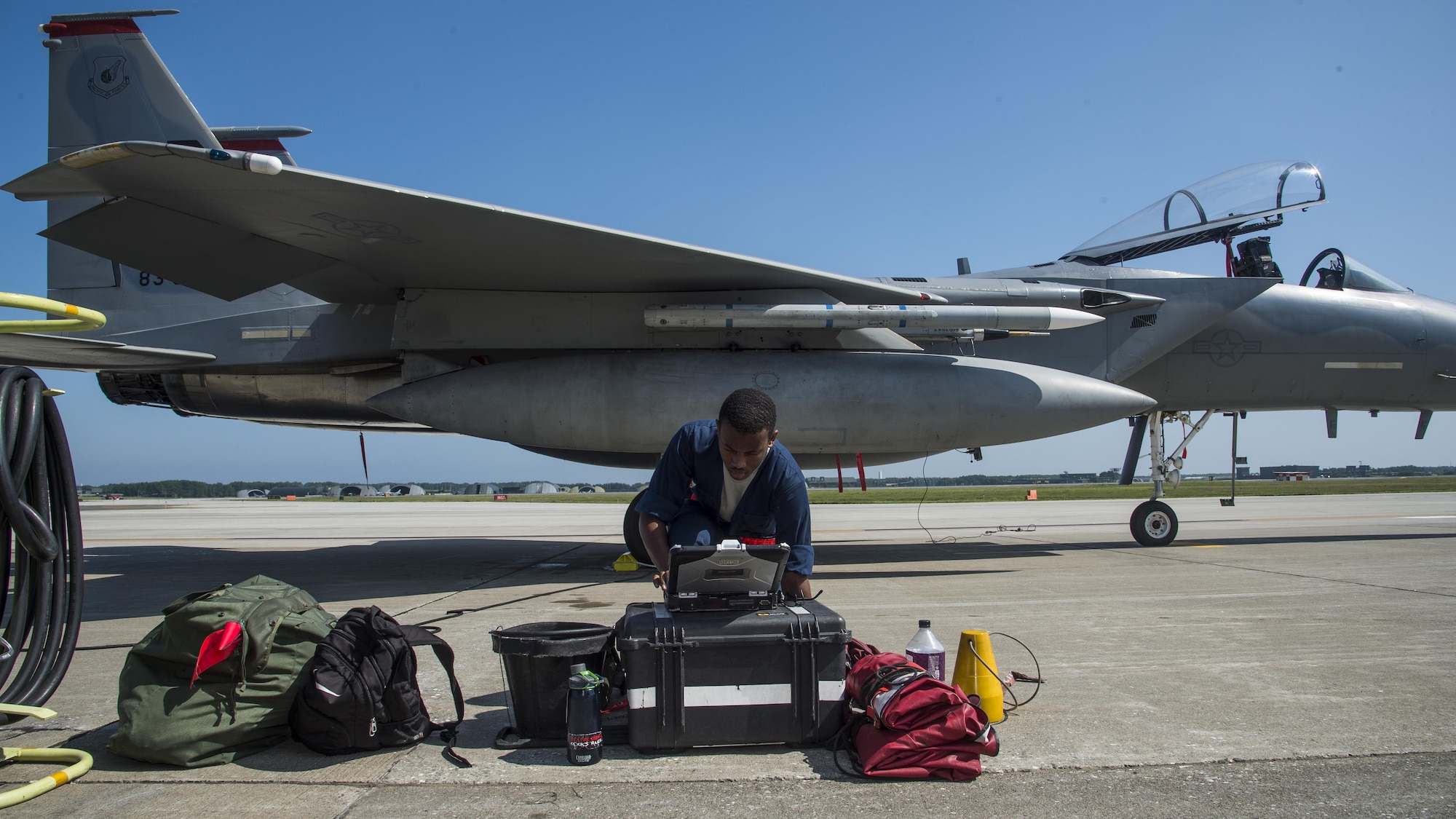 U.S. Air Force Senior Airman Devin Ross, an 18th Aircraft Maintenance Squadron crew chief, conducts preflight procedures prior to an F-15C Eagle flight at Misawa Air Base, Japan, June 13, 2017. Due to its strategic location in northern Japan, Misawa AB is a hub for contingency operations for airframes and units forward deployed across the Indo-Asia-Pacific region. It is important during trainings like these to test the abilities of the pilots and maintainers who work alongside the aircraft. Ross is assigned to Kadena Air Base, Japan. (U.S. Air Force photo by Staff Sgt. Deana Heitzman)