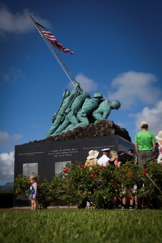 MARINE CORPS BASE HAWAII - The family of John Finn visits the Pacific War Memorial during their tour aboard Marine Corps Base Hawaii July 14, 2017. The tour allowed family members to explore the legacy left by Finn after carrying out the feats of heroism that earned himself the first Medal of Honor of WWII. (U.S. Marine Corps Photo by Lance Cpl. Luke Kuennen)