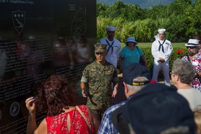MARINE CORPS BASE HAWAII - Col. Raul Lianez, the base commanding officer of Marine Corps Base Hawaii, addresses the family of John Finn at the Pacific War Memorial during their tour aboard MCB Hawaii July 14, 2017. The tour allowed family members to explore the legacy left by Finn after carrying out the feats of heroism that earned himself the first Medal of Honor of WWII. (U.S. Marine Corps Photo by Cpl. Zachary Orr)