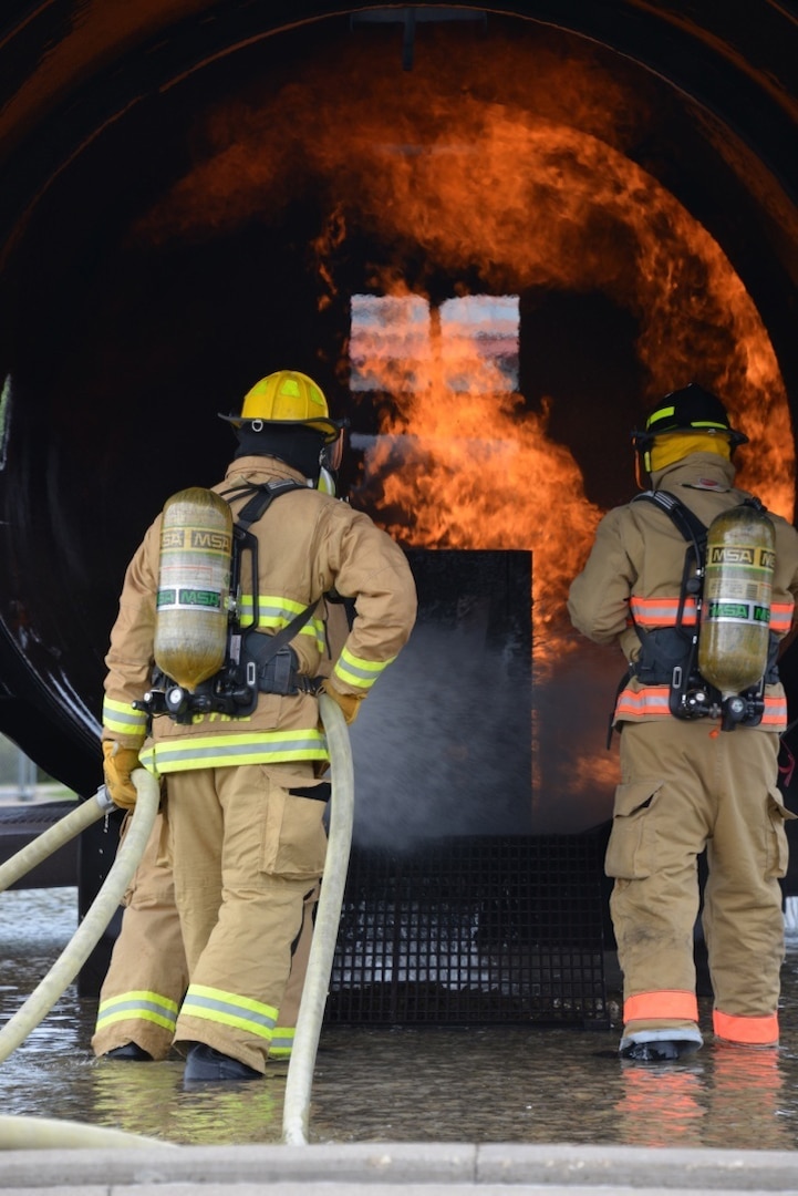 Firefighters from Army and Air National Guard units conduct interior aircraft rescue firefighter training to satisfy annual requirements during PATRIOT North 17 at Volk Field Combat Readiness and Training Center July 15, 2017. PATRIOT is a Domestic Operations disaster-response training exercise conducted by National Guard units working with federal, state and local emergency management agencies and first responders. 