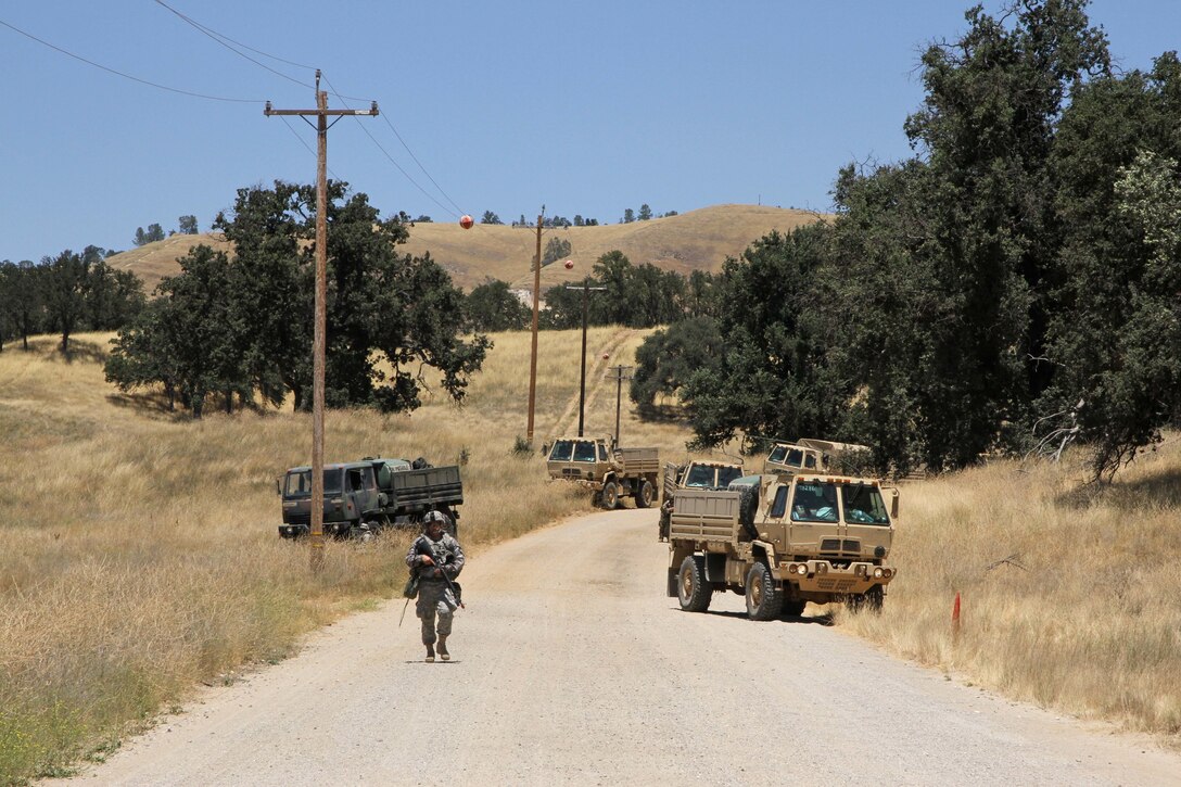 U.S. Army National Guard Soldiers from the 149 Chemical, Biological, Radiological, Nuclear (CBRN) Company, 49th Military Police Brigade, California Army National Guard, stop their convoy along the sides of the road during a Combat Support Training Exercise (CSTX) at Fort Hunter Liggett, Calif., July 12, 2017. Nearly 5,400 service members from the U.S. Army Reserve, U.S. Army, Army National Guard, U.S. Navy, and Canadian Armed Forces are training at Fort Hunter Liggett as part of the 84th Training Command's CSTX 91-17-03; this is a unique training opportunity that allows U.S. Army Reserve units to train alongside their multi-component and joint partners as part of the America's Army Reserve evolution into the most lethal Federal Reserve force in the history of the nation. (U.S. Army Reserve photo by Sgt. 1st Class Joy Dulen)