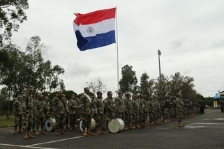 The Paraguayan army band plays at the Fuerzas Comando 2017 opening ceremony July 17, 2017, in Mariano Roque Alonso, Paraguay. Fuerzas Comando is a fellowship program that promotes military-to-military relationships for all teams involved. (U.S. Army photo by Sgt. Christine Lorenz/Released)