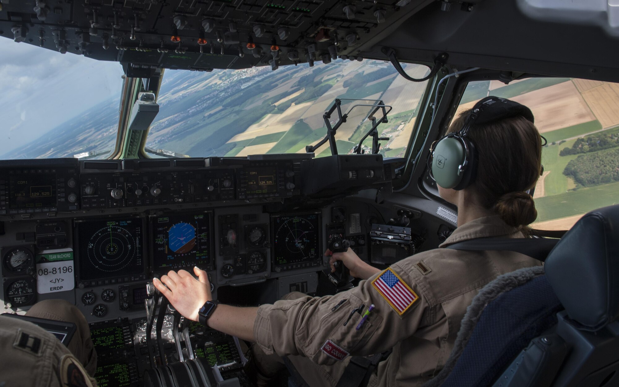 U.S. Air Force Reserve 2nd Lt. Reily Finnelly, 97th Airlift Squadron pilot, flies a C-17 Globemaster III to transport U.S. Army 2nd Cavalry Regiment Interim Armored Vehicle Strykers to Plovdiv Airport, Bulgaria, July 14, 2017. The U.S. Air Force's capability for rapid mobility allows U.S. and allied power to be projected quickly to anywhere on the globe. (U.S. Air Force photo by Senior Airman Tryphena Mayhugh)