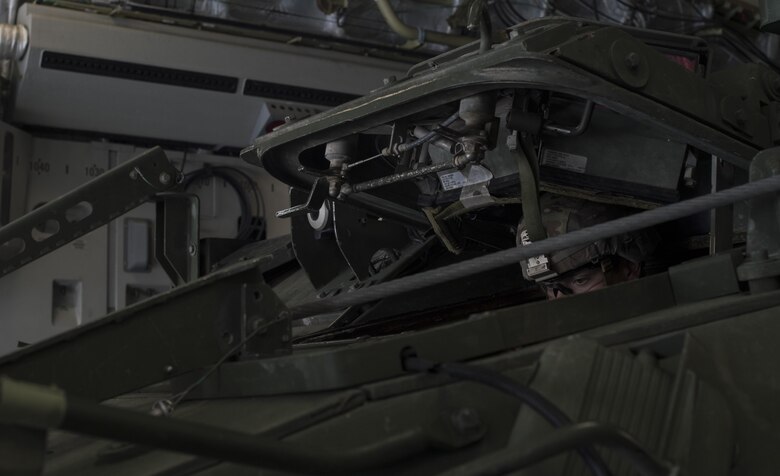 A U.S. Army soldier prepares to drive a U.S. Army 2nd Cavalry Regiment Interim Armored Vehicle Stryker out of a U.S. Air Force C-17 Globemaster III at Plovdiv Airport, Bulgaria, July 13, 2017. The U.S. Air Force's capability for rapid mobility allows U.S. and allied power to be projected quickly to anywhere on the globe. (U.S. Air Force photo by Senior Airman Tryphena Mayhugh)
