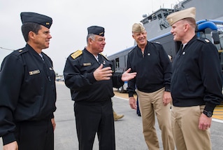 CALLAO, Peru (July 16, 2017) Peruvian navy Rear Adm. Alberto Alcala, commander, Surface Force Peru, left, Vice Adm. Fernando Cerdan, commander general of Pacific Operations, left center, Rear Adm. Sean S. Buck, commander, U.S. Naval Forces Southern Command/U.S. 4th Fleet, left center, and Master Chief Petty Officer of the Navy Steven S. Giordano, meet during an international cuisine festival as part of UNITAS 2017. UNITAS is an annual multinational exercise that focuses on strengthening our existing regional partnerships and encourages establishing new relationships through the exchange of maritime mission-focused knowledge and expertise throughout the exercise. (U.S. Navy photo by Mass Communication Specialist 2nd Class Bill Dodge/Released)