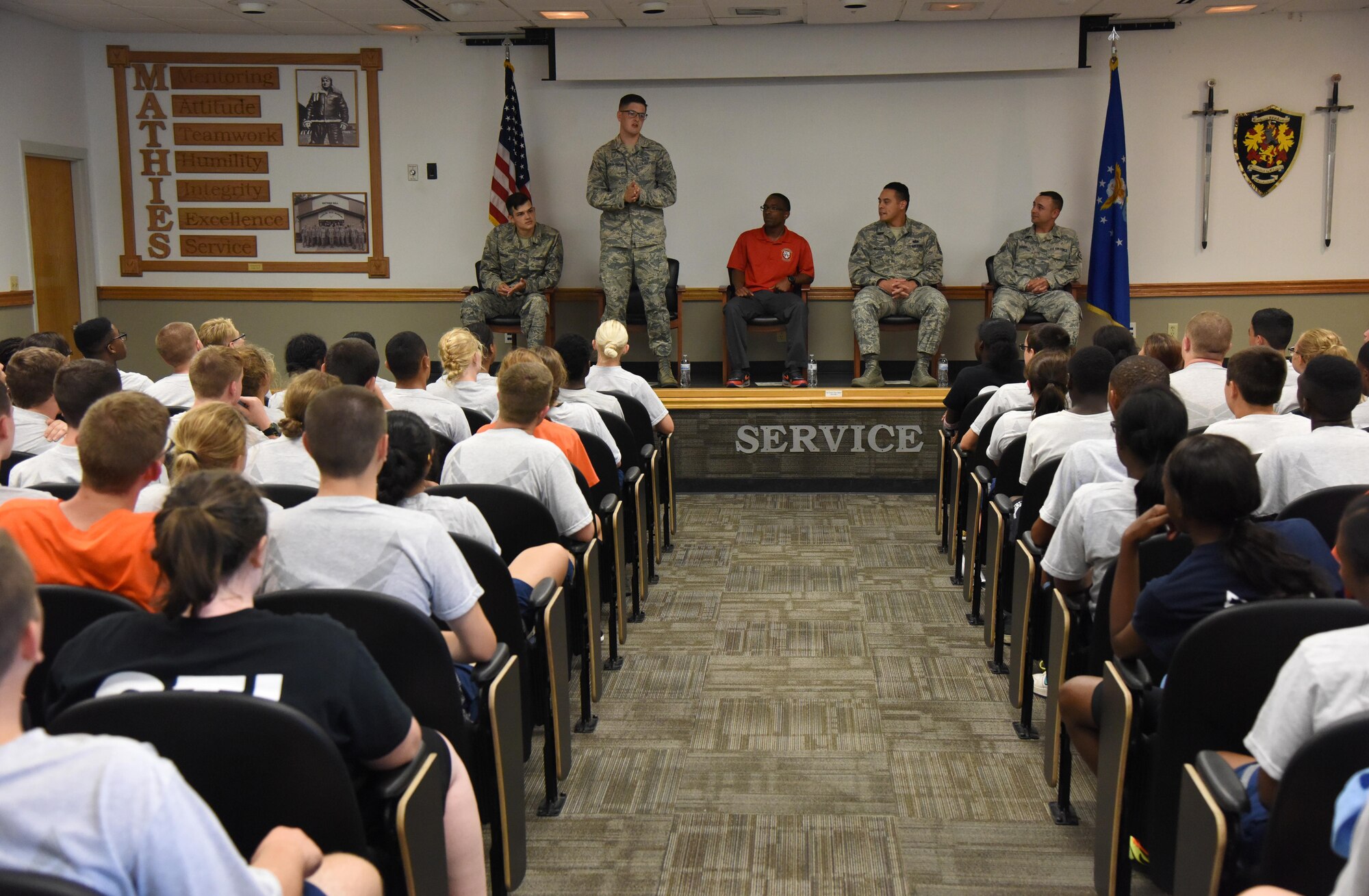 Senior Airman Dylan Sluder-Brehm, 81st Diagnostic and Therapeutics Squadron pharmacy vault custodian, speaks with Air Force Junior ROTC Cadets during an Airman panel during the JROTC Cadet Leadership Course at the Mathies NCO Academy auditorium July 13, 2017, on Keesler Air Force Base, Miss. Approximately 140 JROTC students from 15 high schools in five states attended the week-long course at Keesler that ended with a parade and graduation ceremony. (U.S. Air Force photo by Kemberly Groue)