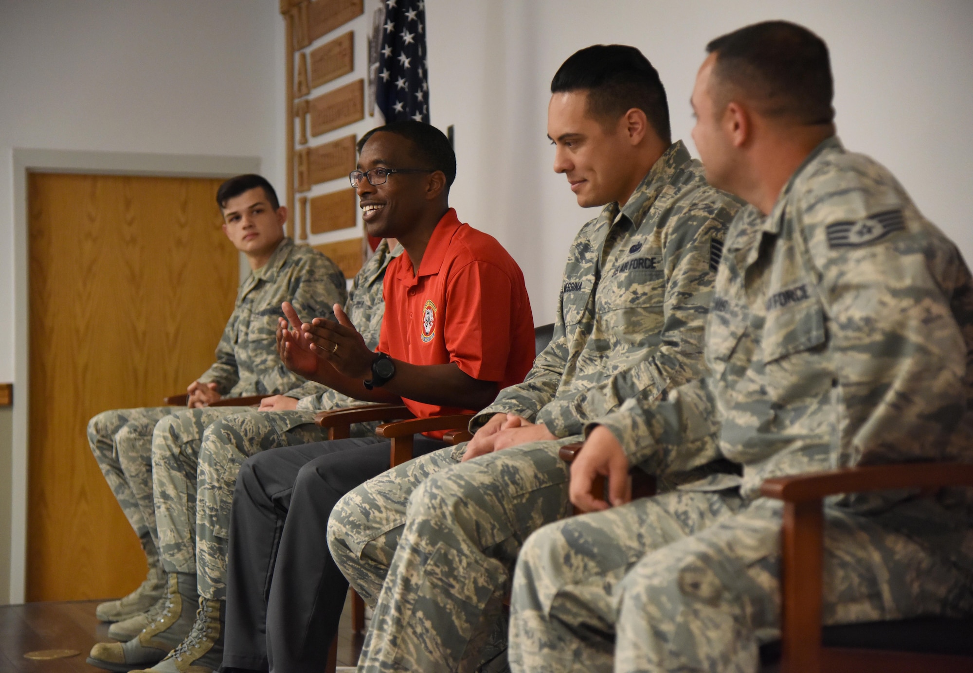 Tech. Sgt. Terry Hall, 336th Training Squadron instructor, speaks with Air Force Junior ROTC Cadets during an Airman panel during the JROTC Cadet Leadership Course at the Mathies NCO Academy auditorium July 13, 2017, on Keesler Air Force Base, Miss. Approximately 140 JROTC students from 15 high schools in five states attended the week-long course at Keesler that ended with a parade and graduation ceremony. (U.S. Air Force photo by Kemberly Groue)