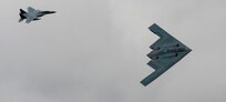 A U.S. Air Force B-2 Stealth Bomber and an F-15 Strike Eagle fly past spectators during the 2017 Royal International Air Tattoo (RIAT) located at RAF Fairford, United Kingdom, on July 16, 2017. This year commemorates the U.S. Air Force’s 70th Anniversary, which was highlighted during RIAT by displaying its lineage and advancements in military aircraft. (U.S. Air Force photo by Tech. Sgt. Brian Kimball)