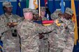 Maj. Gen. Blake C. Ortner, commanding general of the 29th Infantry Division, and Command Sgt. Maj. Ronald L. Smith, senior enlisted advisor, case the division colors during the Task Force Spartan transfer of authority ceremony, at Camp Arifjan, Kuwait, July 13, 2017. The 29th Infantry Division handed over control of TF Spartan, part of Operation Spartan Shield to the 35th Infantry Division. TF Spartan highlights the vital role played by Army National Guard and Army Reserve Soldiers in operations around the world.