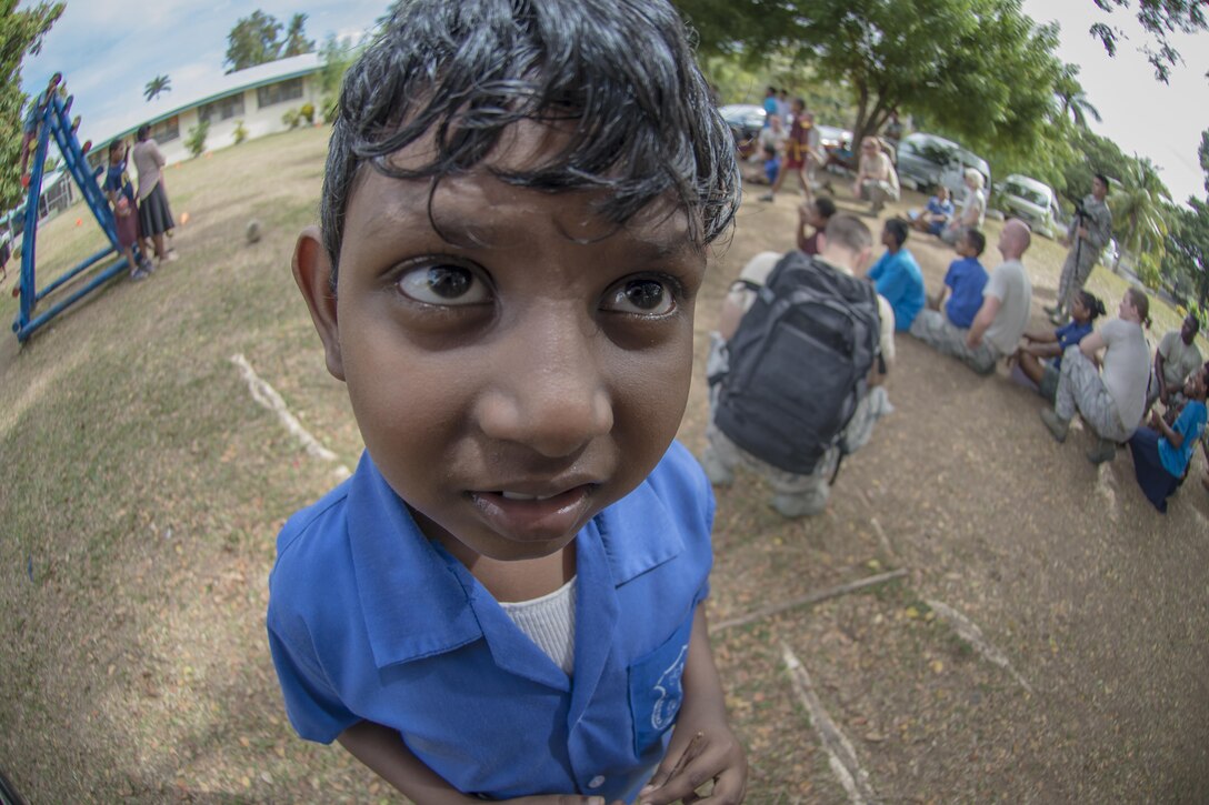 A Fijian student poses for a photo during a sports day community engagement activity at the Lautoka School for Special Education in Lautoka, Fiji, July 14, 2017. The sports day paired U.S. service members with nearly 50 students for numerous games designed to bring the two nations closer as allies and friends. The Americans are in Fiji as part of exercise Pacific Angel 17-3, working with the Fijian government to provide humanitarian assistance and subject-matter-expert exchanges. Air Force photo by Tech. Sgt. Benjamin W. Stratton