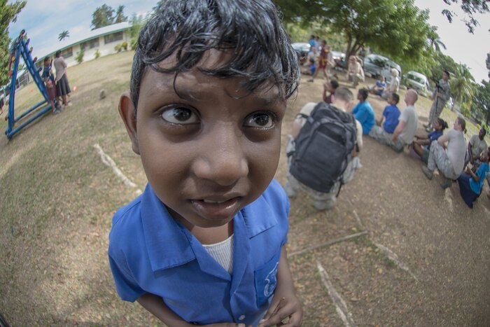 A Fijian student poses for a photo during a sports day community engagement activity at the Lautoka School for Special Education in Lautoka, Fiji, July 14, 2017. The sports day paired U.S. service members with nearly 50 students for numerous games designed to bring the two nations closer as allies and friends. The Americans are in Fiji as part of exercise Pacific Angel 17-3, working with the Fijian government to provide humanitarian assistance and subject-matter-expert exchanges. Air Force photo by Tech. Sgt. Benjamin W. Stratton