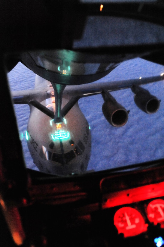 A C-17 Globemaster III receives fuel from a KC-135 Stratotanker aircraft over the Pacific Ocean, July 12, 2017, while participating in exercise Talisman Saber 2017 . Air Force photo by Staff Sgt. Rachel Waller