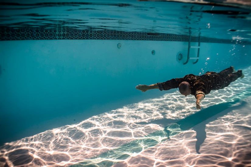 U.S. Marines with Special Purpose Marine Air-Ground Task Force – Southern Command conduct water survival training with U.S. Army soldiers from JTF-Bravo Medical Element at Soto Cano Air Base, June 13, 2017. This week-long training class went over different survival techniques, swimming tips, uniform flotation methods and physical training. (U.S. Air National Guard photo by Master Sgt. Scott Thompson/released)