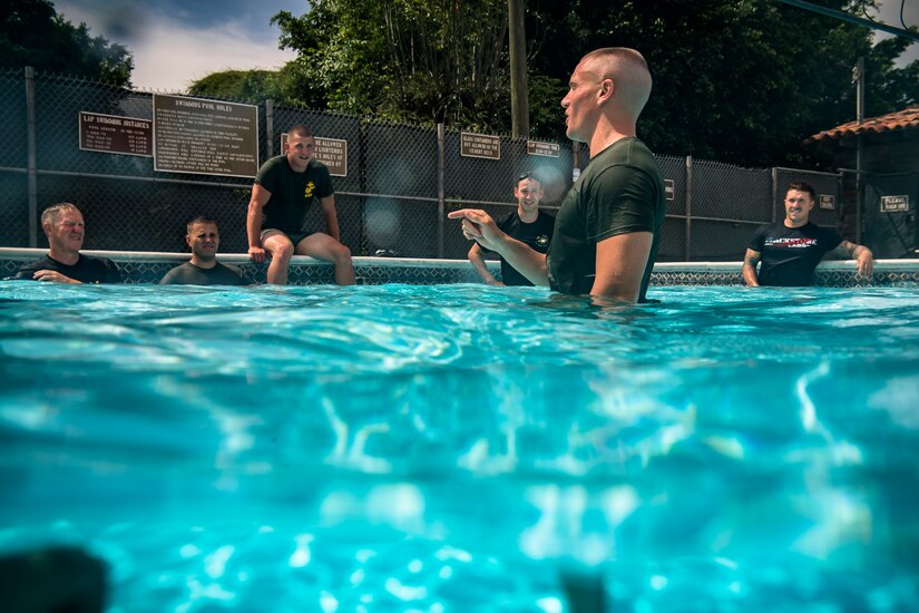 U.S. Marines with Special Purpose Marine Air-Ground Task Force – Southern Command conduct water survival training with U.S. Army soldiers from JTF-Bravo Medical Element at Soto Cano Air Base, June 13, 2017. This week-long training class went over different survival techniques, swimming tips, uniform flotation methods and physical training. (U.S. Air National Guard photo by Master Sgt. Scott Thompson/released)