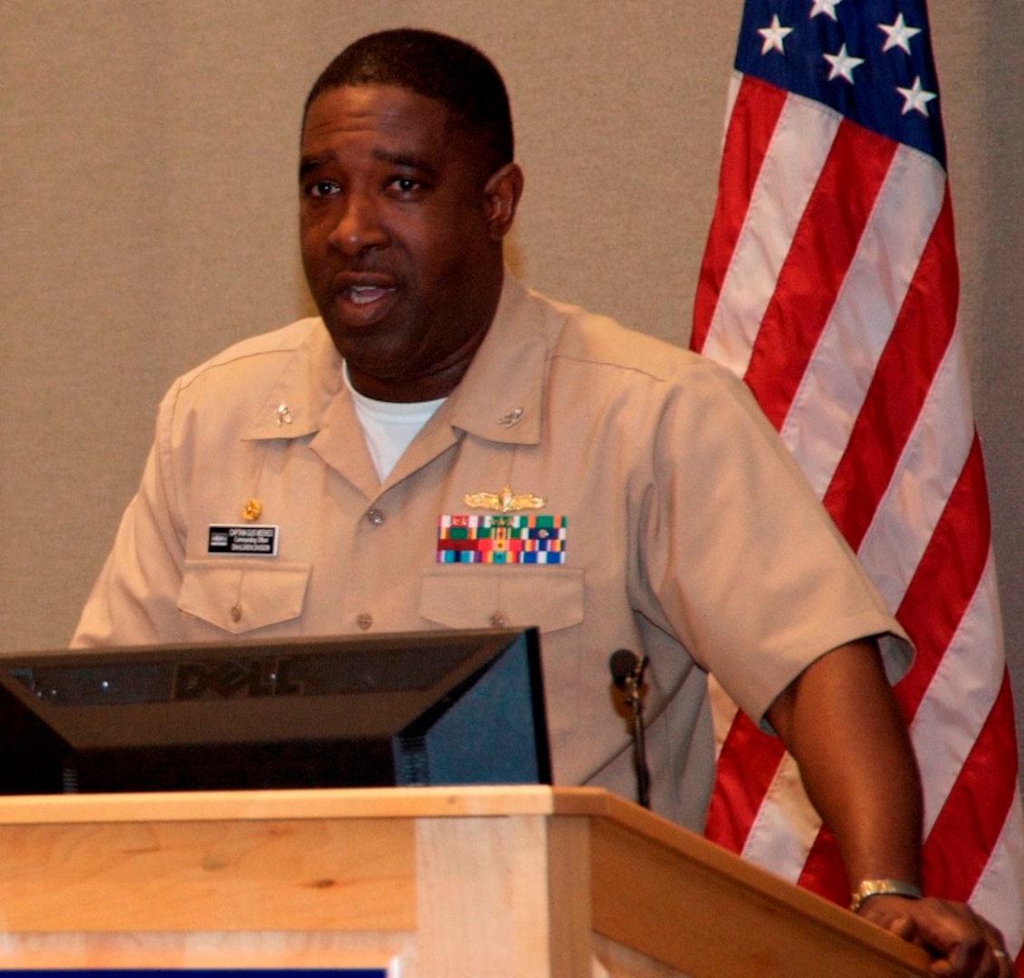 DAHLGREN, Va. (July 7, 2017) - Naval Surface Warfare Center Dahlgren Division (NSWCDD) Commanding Officer Capt. Godfrey 'Gus' Weekes speaks to military, government civilian, and defense contractors at the NSWCDD-sponsored 2017 Lesbian, Gay, Bisexual and Transgender (LGBT) Pride Month Observance. “LGBT Pride Month affirms our commitment to increase awareness, mutual respect, and understanding of all members of our workforce," said Weekes. "Let’s take the theme 'Ask, Share and Learn' to heart and embrace knowing more about our colleagues and celebrating our collective diversity.” Established by Presidential Proclamation in 2000, LGBT Pride Month is held annually and recognizes the importance of diversity within our society as well as the many achievements of LGBT individuals.  (U.S. Navy Photo by Patrick Dunn/Released)