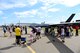 Spectators gather around the MQ-9 Reaper to learn about its capabilities July 15, 2017, at the Lethbridge International Air Show in Alberta, Canada. Airmen from the 432nd Wing supported the airshow with the MQ-9 to showcase its capabilities and to dispel common beliefs about remotely piloted aircraft. (U.S. Air Force photo/Senior Airman Christian Clausen)