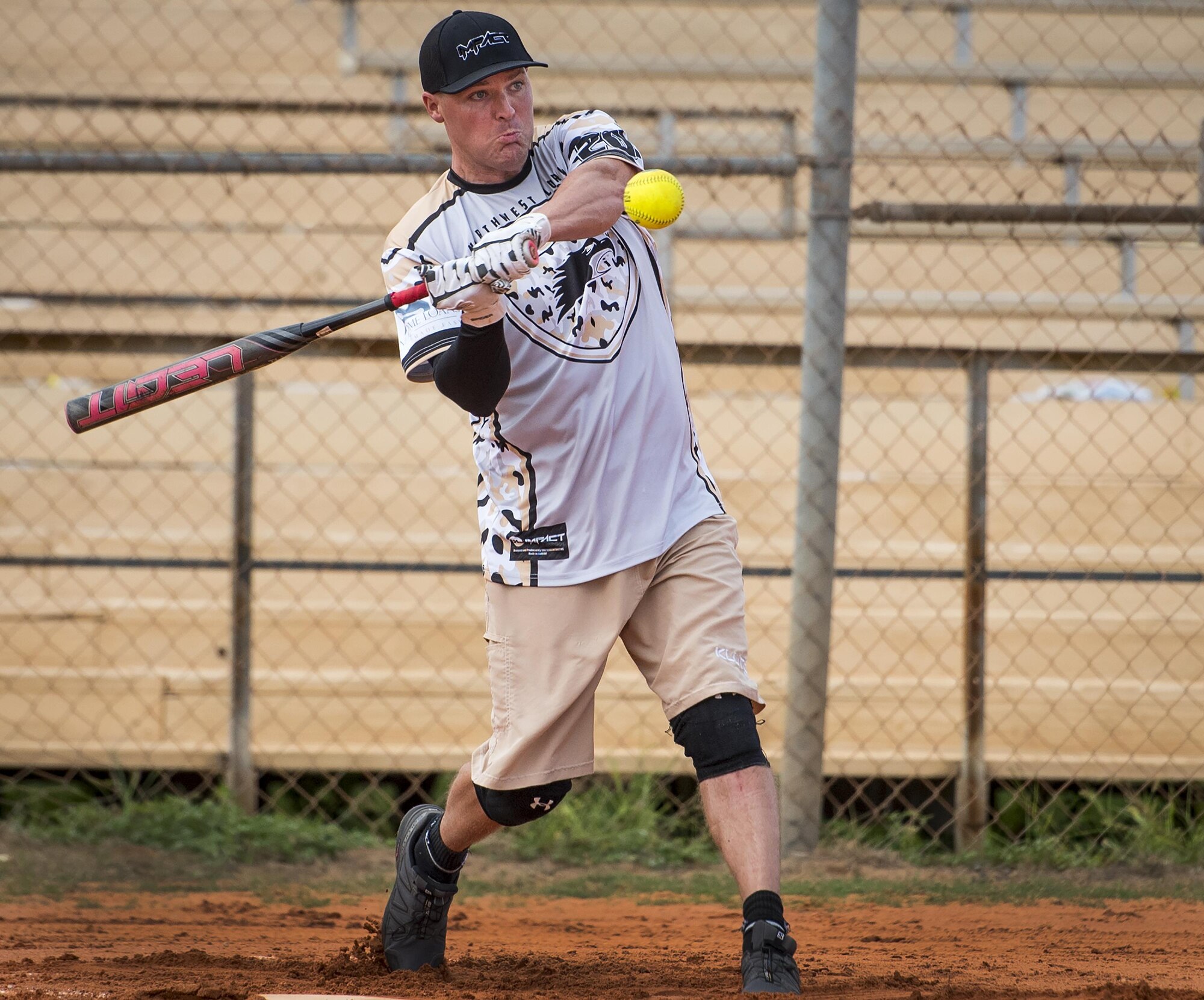 George Adams, 359th Training Squadron softball team, swings for the fences during an intramural game against the 96th Maintenance Squadron team July 17 at Eglin Air Force Base, Fla.  The league-leading Maintainers pounded the training squadron 10-5 to improve to 9-1 on the season.  (U.S. Air Force photo/Samuel King Jr.)