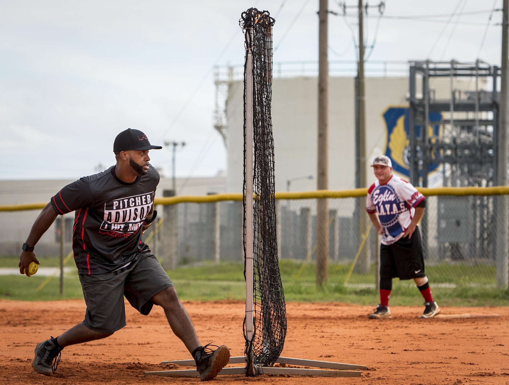 Jason Little, 359th Training Squadron softball team pitcher, prepares to deliver a pitch during an intramural game against the 96th Maintenance Squadron team July 17 at Eglin Air Force Base, Fla.  The league-leading Maintainers pounded the training squadron 10-5 to improve to 9-1 on the season.  (U.S. Air Force photo/Samuel King Jr.)