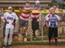 Clad in red white and blue, 96th Maintenance Squadron team members watch the intramural softball game against the 359th Training Squadron team July 17 at Eglin Air Force Base, Fla.  The league-leading Maintainers pounded the Training Squadron 10-5 to improve to 9-1 on the season.  (U.S. Air Force photo/Samuel King Jr.)