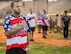 Kris Hampton, 96th Maintenance Squadron, stands with his hand over his heart during the National Anthem prior to his team’s intramural softball game against the 359th Training Squadron team July 17 at Eglin Air Force Base, Fla.  The league-leading Maintainers pounded the training squadron 10-5 to improve to 9-1 on the season.  (U.S. Air Force photo/Samuel King Jr.)