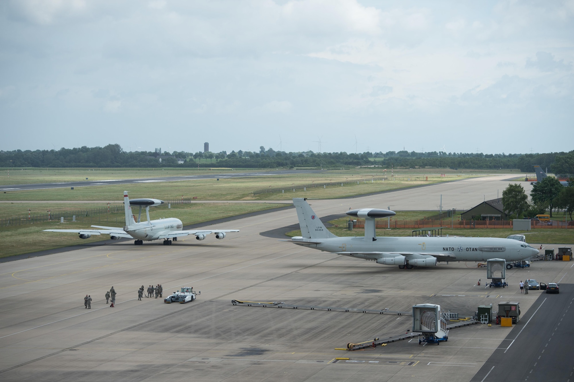A U.S Air Force E-3 Sentry taxis past a NATO E-3A Airborne Warning and Control System aircraft on June 7, 2017, at NATO Air Base Geilenkirchen, Germany. The Planning Development office at Hanscom Air Force Base, Mass., is developing options for future concepts for advanced battle management and surveillance capabilities. Efforts on ABMS provide the warfighter with command and control capabilities currently conducted by AWACS. Analysis of this project is expected to be complete by March 2018. (U.S. Air Force photo/2nd Lt. Caleb Wanzer)