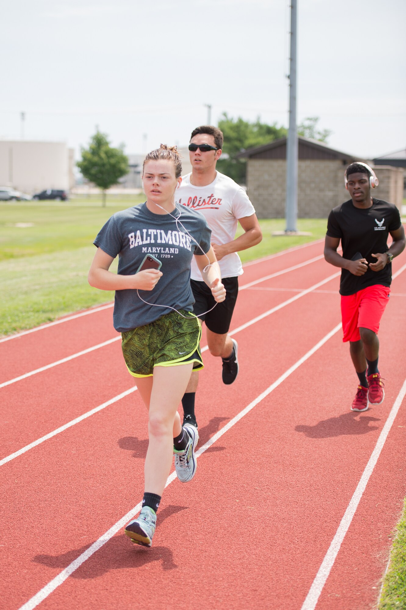 Delayed Enlistment Program members perform the 1.5 mile run portion of the Physical Ability and Stamina test July 12, 2017, at Dover Air Force Base, Del. As of 2016 all special operations job billets are open to women who can complete testing and training. (U.S. Air Force photo by Mauricio Campino)