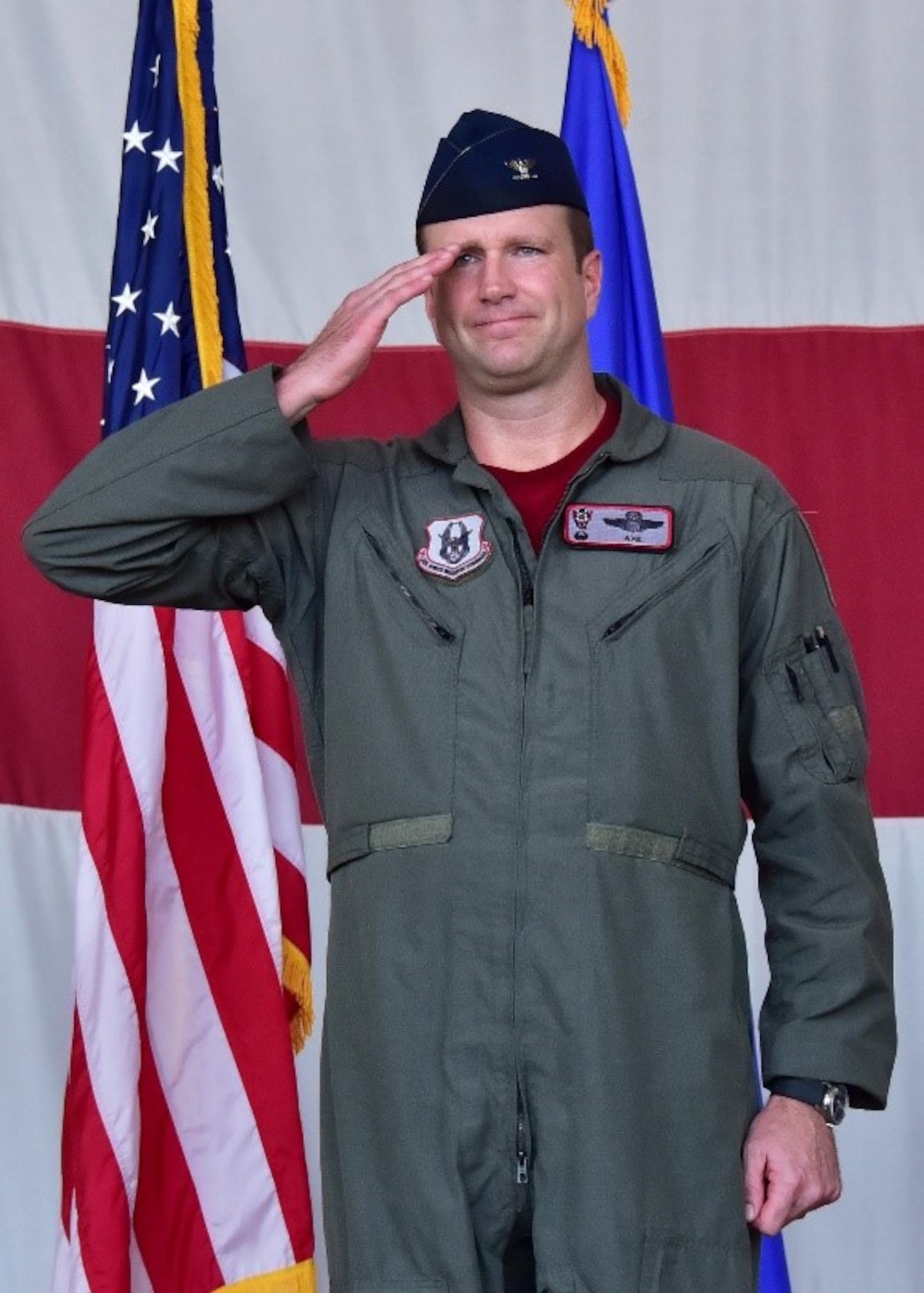 Col. Korey Amundson, the new 944th Operations Group commander, salutes his troops July 14 during a change of command ceremony at Luke Air Force Base, Ariz. (U.S. Air Force phot by Tech. Sgt. Louis Vega Jr.)