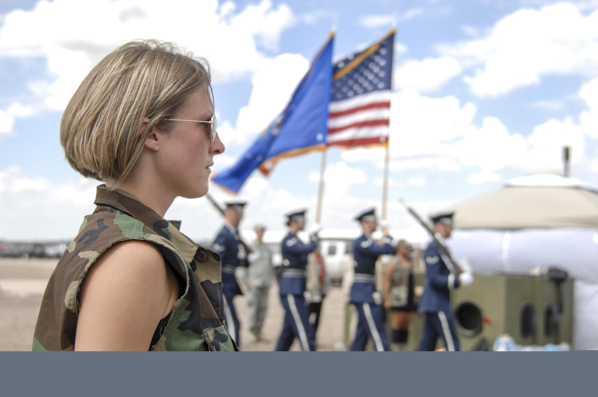 Team Buckley members enjoy a Combat Dining Out hosted July 14, 2017, at Camp Rattlesnake on Buckley Air Force Base, Colo. The Combat Dining Out paid tribute to 70 years of Air Force History, while giving members an opportunity to build morale and esprit de corps with their fellow wingmen. (U.S. Air Force photo by Tech. Sgt. Nicholas Rau)