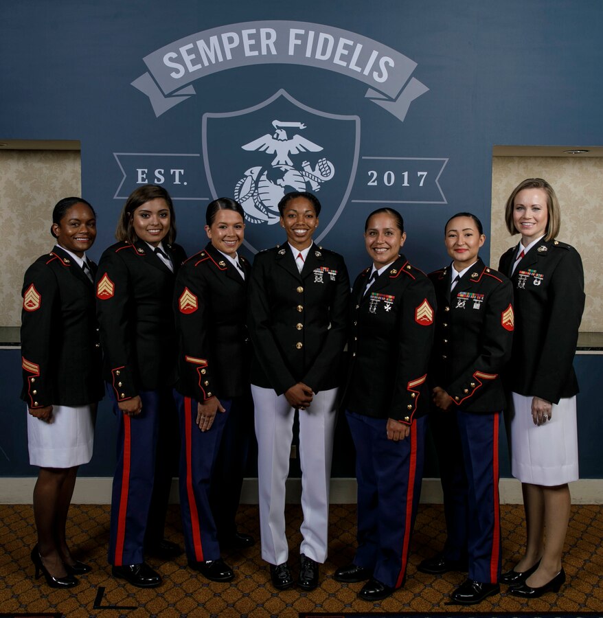 U.S. Marines pose for a photo during the Semper Fidelis All- American Program and Battles Won Academy on July 16, 2017. Selected Students from across the Nation, along with their mentors, participate in the Semper Fidelis All- American Program and Battles Won Academy July 13-16, 2017 in Washington D.C, VA. The Semper Fidelis All-American Program and Battles Won Academy celebrate the exceptional qualities demonstrated by an elite group of young athletic leaders