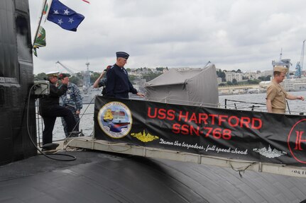 United States Air Force Gen. John E. Hyten, commander of U.S. Strategic Command (USSTRATCOM), departs the U.S. Navy Los Angeles-class fast attack submarine USS Hartford (SSN 768) in Brest, France, July 10, 2017. While on board, he toured the submarine, received briefings and met with the crew. Hyten is visiting Europe to deepen relationships with senior U.S. and allied military leaders and better integrate USSTRATCOM capabilities with other combatant commands.
