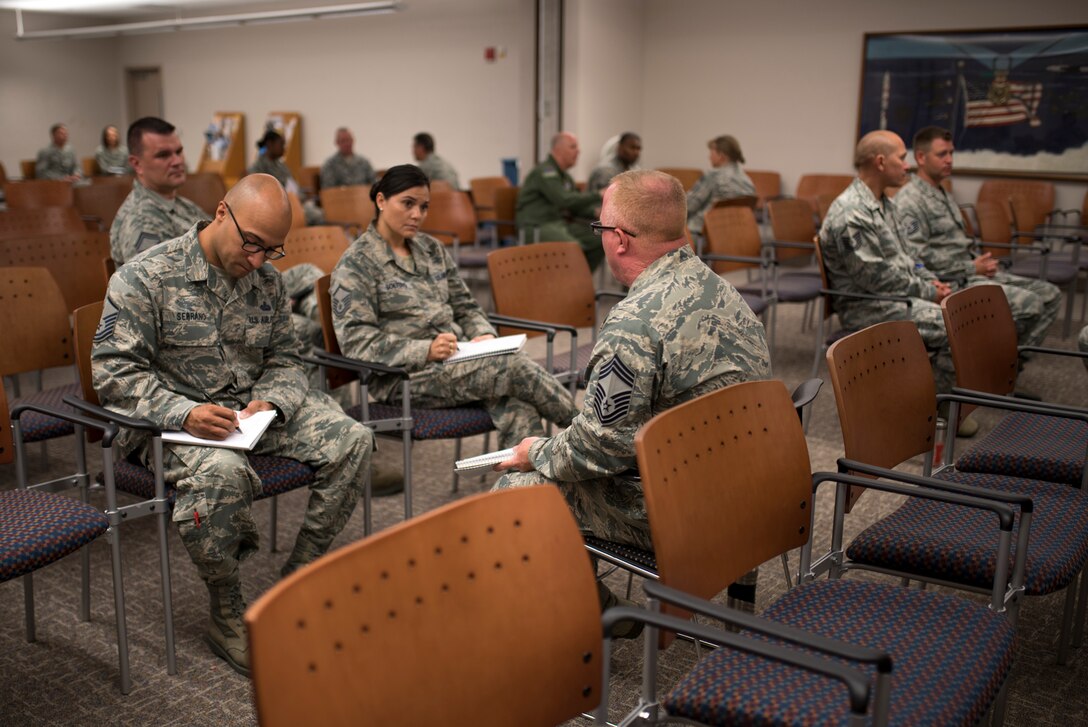 PETERSON AIR FORCE BASE, Colo. – Chief Master Sgt. Mark Holling, U.S. Air Force Academy Mission Support Group chief, mentors senior NOCs during a speed mentoring session during Chief’s Week at Peterson Air Force Base, Colo., July 12, 2017. Chief master sergeants ranging from group level to numbered air force were in attendance to offer mentorship to Team Pete senior NCOs. (U.S. Air Force photo by Senior Airman Dennis Hoffman)