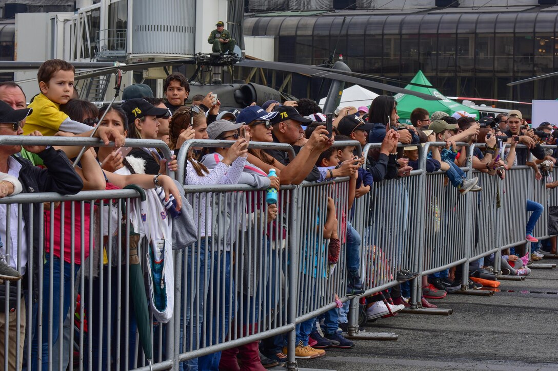 Guests watch the aerial demonstrations at José María Córdova International Airport during F-AIR Colombia 2017 in Rionegro, Colombia, July 15, 2017. The United States Air Force is participating in the four-day air show with two South Carolina Air National Guard F-16s as static displays, plus static displays of a KC-135, KC-10, along with an F-16 aerial demonstration by the Air Combat Command’s Viper East Demo Team. The United States military participation in the air show provides an opportunity to strengthen our military-to-military relationships with regional partners and provides the opportunity to meet with Colombian air force counterparts. (U.S. Air National Guard photo by Senior Airman Megan Floyd)