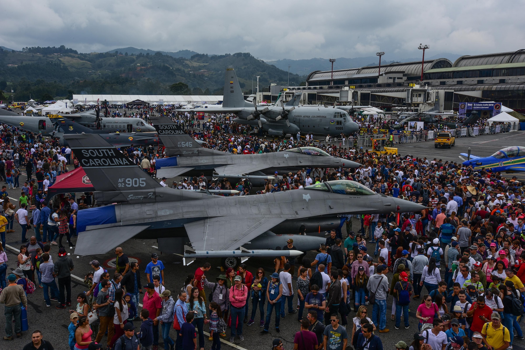 Guests watch the aerial demonstrations at José María Córdova International Airport during Feria Aeronautica Internacional—Colombia 2017 in Rionegro, Colombia, July 15, 2017. The United States Air Force is participating in the four-day air show with two South Carolina Air National Guard F-16s as static displays, plus many other displays. 