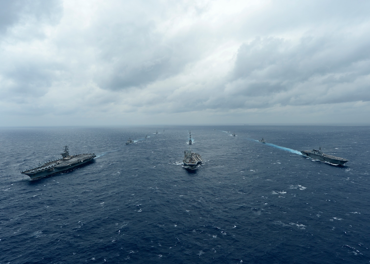 BAY OF BENGAL (July 17, 2017) Ships from the Indian Navy, Japan Maritime Self-Defense Force (JMSDF) and the U.S. Navy sail in formation, July 17, 2017, in the Bay of Bengal as part of Exercise Malabar 2017. Malabar 2017 is the latest in a continuing series of exercises between the Indian Navy, JMSDF and U.S. Navy that has grown in scope and complexity over the years to address the variety of shared threats to maritime security in the Indo-Asia-Pacific region. (U.S. Navy photo by Mass Communication Specialist 3rd Class Leon Wong)