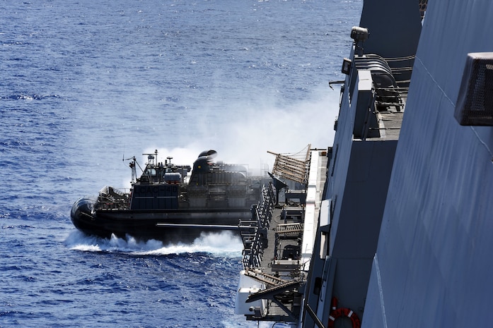 PACIFIC OCEAN (July 14, 2017) - A landing craft, air cushion, assigned to Assault Craft Unit 5, departs the well deck of the amphibious transport dock ship USS San Diego (LPD 22), during amphibious operations as part of a sustainment exercise. San Diego is embarked on a scheduled deployment as part of the America Amphibious Ready Group, which is comprised of more than 1,800 Sailors and 2,600 Marines assigned to the amphibious assault ship USS America (LHA 6), the amphibious dock landing ship USS Pearl Harbor (LSD 52) and San Diego. (U.S. Navy photo by Mass Communication Specialist 1st Class Joseph M. Buliavac/Released)