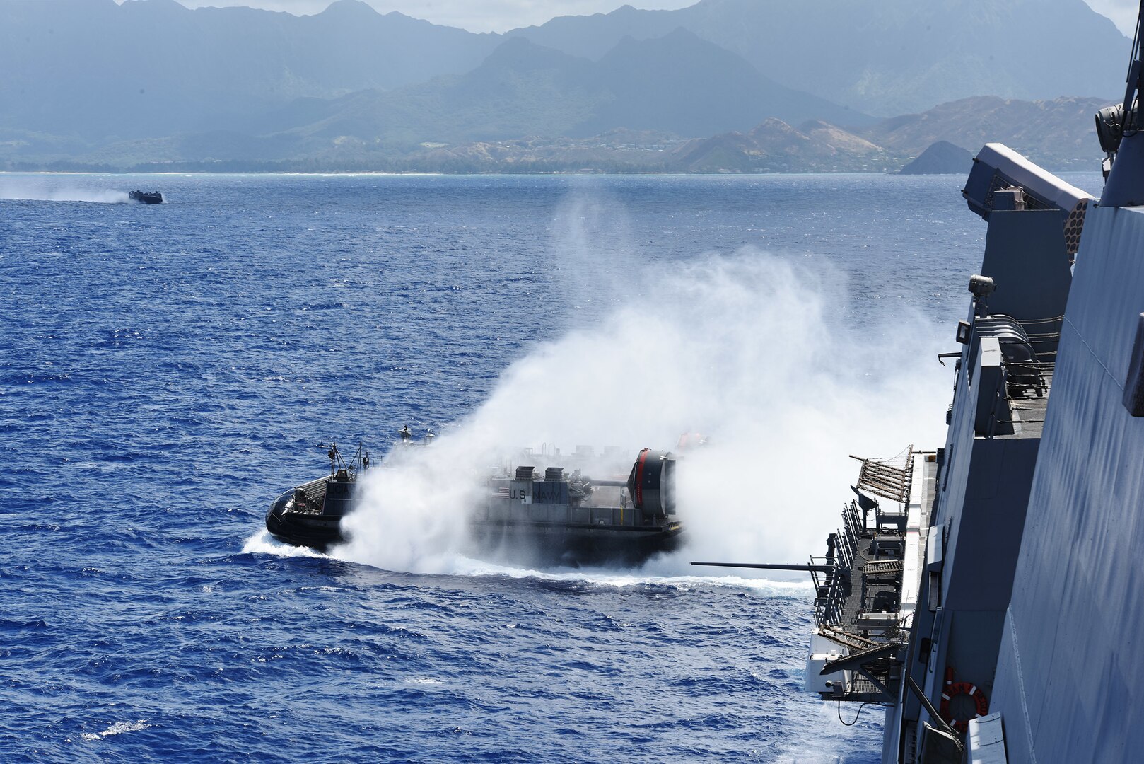 PACIFIC OCEAN (July 14, 2017) - A landing craft, air cushion, assigned to Assault Craft Unit 5, departs the well deck of the amphibious transport dock ship USS San Diego (LPD 22), during amphibious operations as part of a sustainment exercise. San Diego is embarked on a scheduled deployment as part of the America Amphibious Ready Group, which is comprised of more than 1,800 Sailors and 2,600 Marines assigned to the amphibious assault ship USS America (LHA 6), the amphibious dock landing ship USS Pearl Harbor (LSD 52) and San Diego. (U.S. Navy photo by Mass Communication Specialist 1st Class Joseph M. Buliavac/Released)