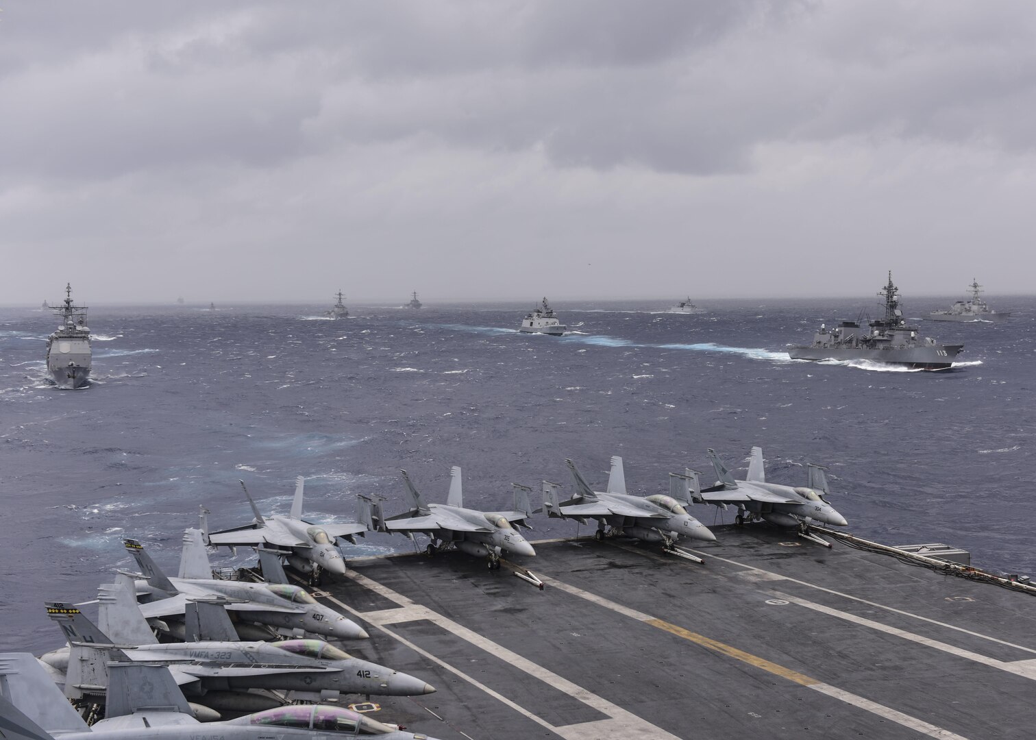 BAY OF BENGAL (July 17, 2017) Ships from the Indian Navy, Japan Maritime Self-Defense Force (JMSDF) and the U.S. Navy sail in formation as part of the conclusion of Exercise Malabar 2017, July 17, 2017 in the Bay of Bengal. Malabar 2017 is the latest in a continuing series of exercises between the Indian Navy, Japan Maritime Self-Defense Force and U.S. Navy that has grown in scope and complexity over the years to address the variety of shared threats to maritime security in the Indo-Asia-Pacific region. (U.S. Navy photo by Mass Communication Specialist 2nd Class Holly L. Herline)