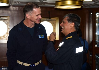 BAY OF BENGAL (July 17, 2017) U.S. Navy Rear Adm. Bill Byrne, commander of Carrier Strike Group 11, left, and Indian Navy Rear Admiral Biswajit Dasgupta, flag officer commanding Eastern Fleet, talk during an admiral visit aboard the aircraft carrier USS Nimitz (CVN 68) as part of the conclusion of Exercise Malabar 2017, July 17, 2017 in the Bay of Bengal. Malabar 2017 is the latest in a continuing series of exercises between the Indian Navy, Japan Maritime Self-Defense Force and U.S. Navy that has grown in scope and complexity over the years to address the variety of shared threats to maritime security in the Indo-Asia-Pacific region. (U.S. Navy photo by Mass Communication Specialist 2nd Class Holly L. Herline)