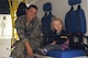 U.S. Air Force Staff Sgt. Bridget Collins, a 354th Medical Group paramedic, sits with a child in an ambulance during a fire department open house July 15, 2017, at Eielson Air Force Base, Alaska. Collins explained to parents and children the importance and use of different pieces of equipment in the ambulance. (U.S. Air Force photo by Airman Eric M. Fisher)
