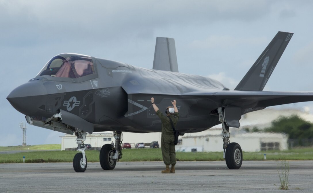 U.S. Marine Corps F-35B Lightning II aircraft resupplies at a hot pit refuel on Kadena Air Force Base, Okinawa, Japan, June 27, 2017. The Marines are with Marine Fighter Attack Squadron 121, Marine Aircraft Group 36, 1st Marine Aircraft Wing. The Marines worked with Airmen from 18th Logistics and Readiness Squadron, 353 Special Operations Group, 18th Wing. The two-day exercise enabled the U.S. Air Force and Marine Corps to improve interoperability and develop tactics, techniques and procedures involving the new aircraft for future joint FARP operations throughout the Indo-Asia Pacific Theater. (U.S. Marine Corps photo by Lance Cpl. Deseree Kamm) 