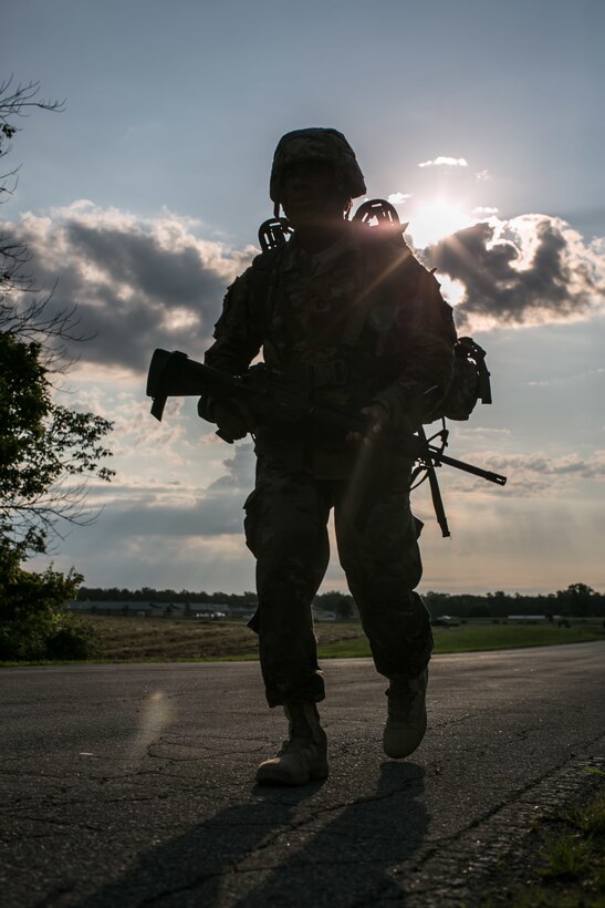Army Sgt. 1st Class Joaquin Spikes approaches the finish line during a 12-mile ruck march at Camp Atterbury, Ind., July 17, 2017, during the 2017 Army Materiel Command's Best Warrior Competition. Spikes is assigned to the U.S. Army Security Assistance Command. Army photo by Sgt. 1st Class Teddy Wade 