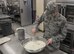 U.S. Air Force Senior Airman Jason Parks, a 35th Force Support Squadron food service technician, prepares mashed potatoes in the Falcon Feeder at Misawa Air Base, Japan, July 18, 2017. Two Airmen work opposite shifts maintaining continuity in the Falcon Feeder ordering all stock and preparing meals for flightline personnel. (U.S. Air Force photo by Airman 1st Class Sadie Colbert)