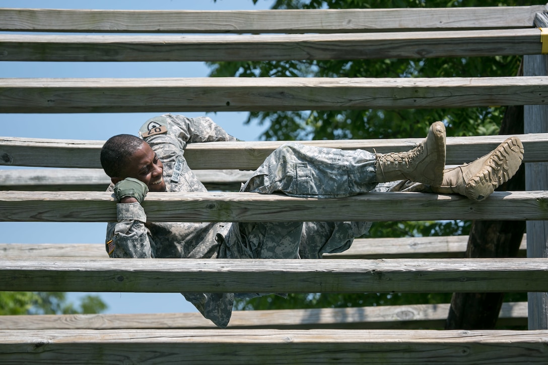 Army Sgt. Luther Witherspoon weaves through an obstacle course at Camp Atterbury, Ind., July 17, 2017, during the 2017 Army Materiel Command's Best Warrior Competition. Witherspoon is assigned to the Army Sustainment Command. Army photo by Sgt. 1st Class Teddy Wade