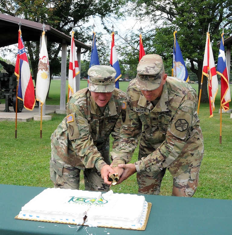 Maj. Gen. Troy D. Kok, commanding general for the U.S. Army Reserve’s 99th Regional Support Command, and Command Sgt. Maj. Patrick McKie, Army Support Activity, Fort Dix command sergeant major, cut the cake July 18 during the Dix Centennial celebration at Joint Base McGuire-Dix-Lakehurst, New Jersey.  Camp Dix provided key support to the Army and the nation from its inception in 1917 until its re-designation as “Fort Dix” in 1939.  On Oct. 1, 2009, Fort Dix transformed into the United States Army Support Activity, Fort Dix and became part of Joint Base McGuire-Dix-Lakehurst.  More than 42,000 active-duty and reserve-component service members, civilian employees and family members work and reside on the base.