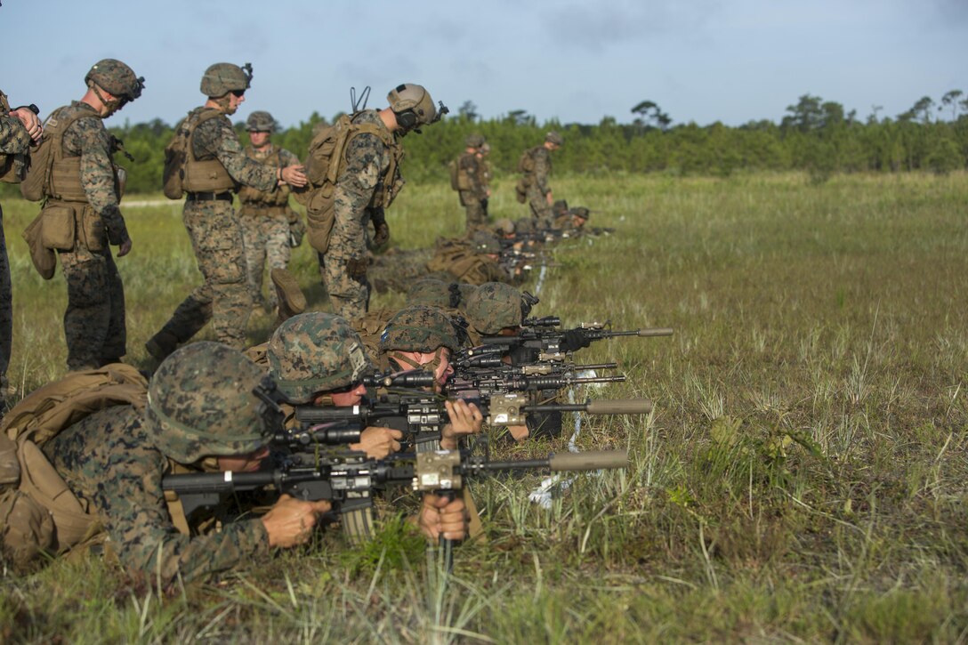U.S. Marines with 1st Battalion, 6th Marine Regiment, 2nd Marine Division (2ndMARDIV), integrate Sea Dragon 2025 weapon systems and gear during a live-fire range at Range G-6, Camp Lejeune, N.C., July 12, 2017. The Sea Dragon 2025 equipment showcased new capabilities for marines to use in future exercises and operations. (U.S. Marine Corps photo by Lance Cpl. Justin X. Toledo)