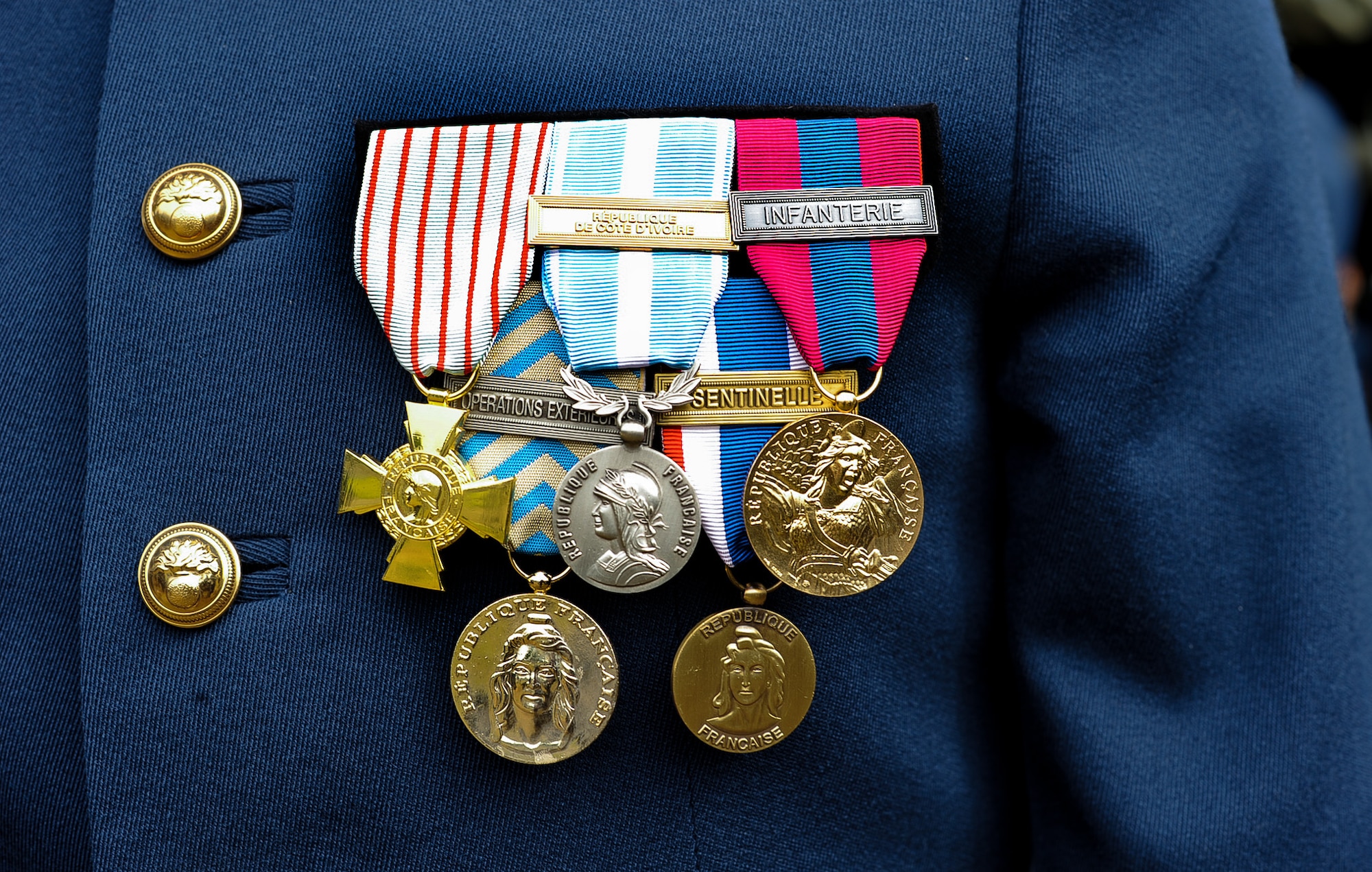 A Bastille Day military parade participant’s medals are displayed on their uniform at Camp de Satory, France, July 12, 2017. U.S. and Armée de Terre military members marched in the Bastille Day military parade at the Avenue des Champs-Élysées, France, on July 14, 2017, to celebrate the French Republic’s National Day. (U.S. Air Force photo by Airman 1st Class Savannah L. Waters)
