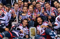 Team USA, 2017 International Ice Hockey Federation In-line Hockey World Championship winners, celebrate with their trophy after their gold-medal victory against Finland at the Ondrej Nepala Arena, Bratislava, Slovakia, July 1, 2017.  Capt. Derrick Burnett, National Reconnaissance Office, chief of mission operations, played his third year as a defenseman for Team USA, this being the first year he made it past the semifinal game. (Photo by Jan Sukup) 