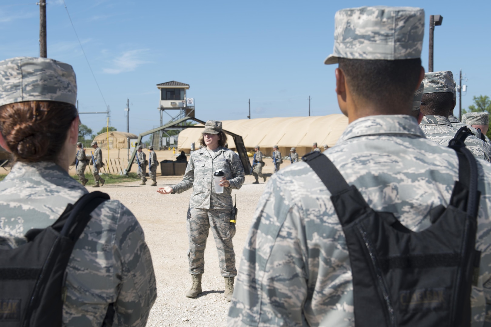 Master Sgt. Crystal Ybarra, 319th Training Squadron military training instructor, provides a tour to chaplain candidates of the Basic Expeditionary Airmen Skills Training at Joint Base San Antonio-Lackland, Texas, July 5, 2017. The tour was part of the Chaplain Candidate Intensive Internship. (U.S. Air Force photo by Senior Airman Krystal Wright)