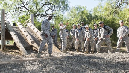 Master Sgt. Crystal Ybarra and Tech. Sgt. Eugene Brown, 319th Training Squadron military training instructors, provide a tour to chaplain candidates of the Basic Expeditionary Airmen Skills Training at Joint Base San Antonio-Lackland, Texas, July 5, 2017. The tour was part of the Chaplain Candidate Intensive Internship. (U.S. Air Force photo by Senior Airman Krystal Wright)